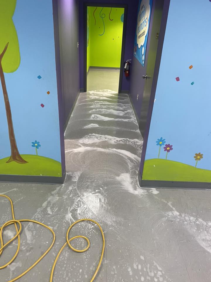 Hallway tile being deep cleaned